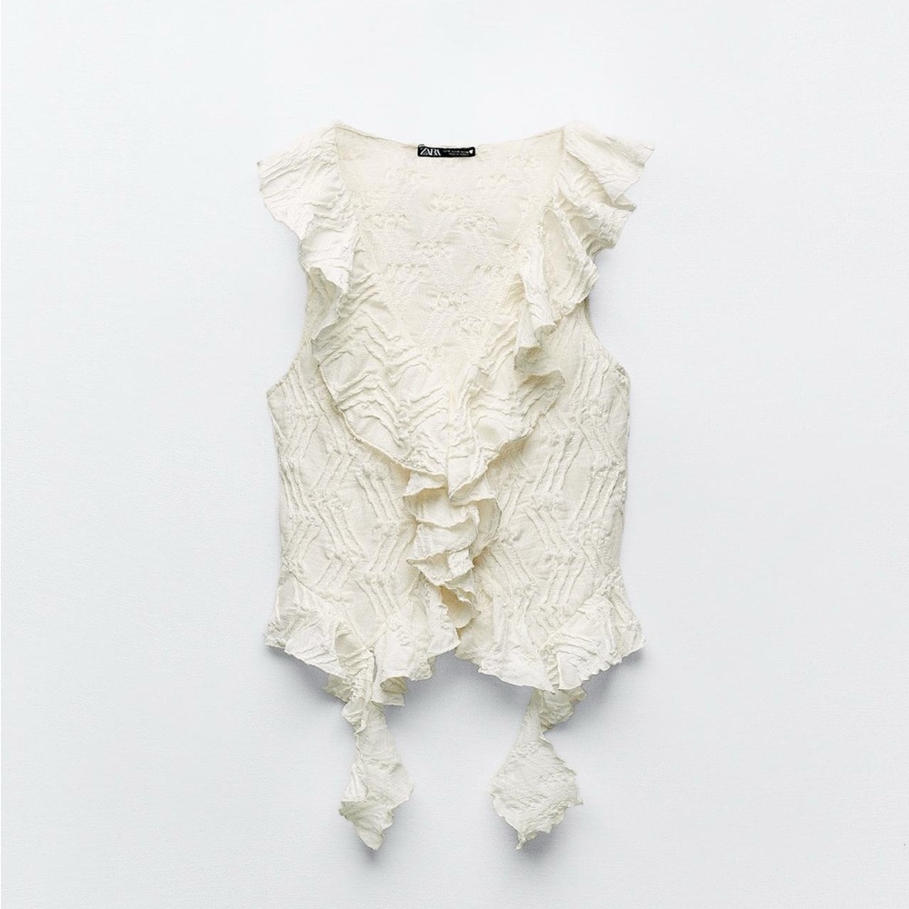 Zara blouse. So cute, never worn!